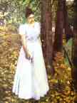 Autumn. Young Woman in a Garden.
