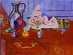 Pink Statuette and Pitcher  on a Red Chest of Drawers.