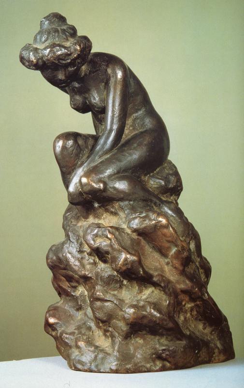 Alphonse Mucha. Nude on a Rock.
